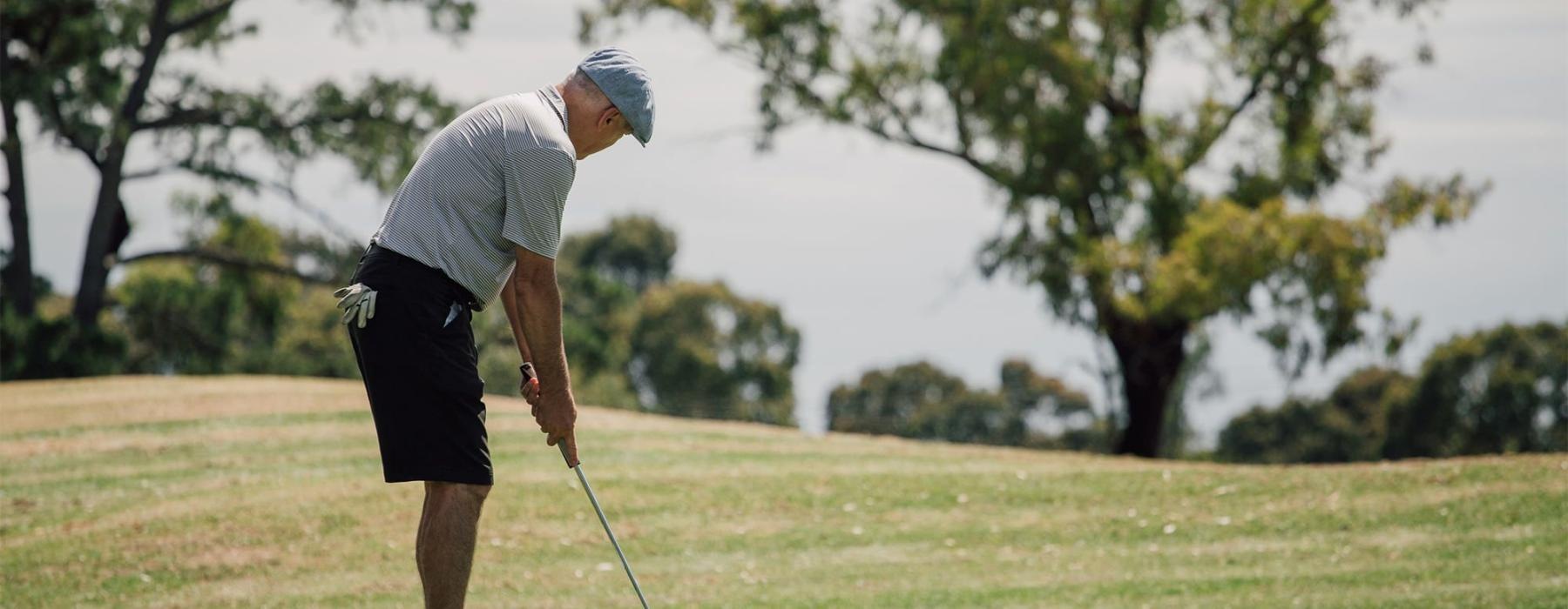 a man playing golf